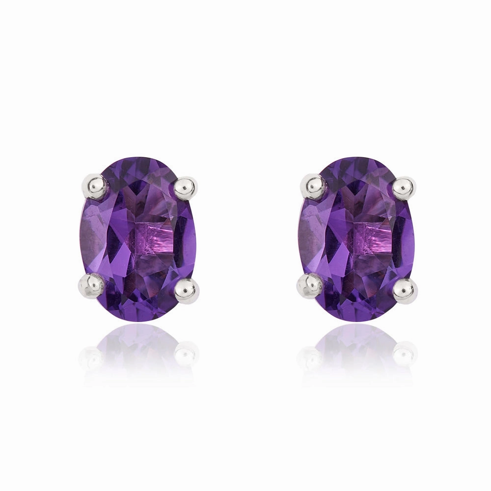 9ct White Gold Amethyst 7x5mm Oval Claw Set Stud Earrings