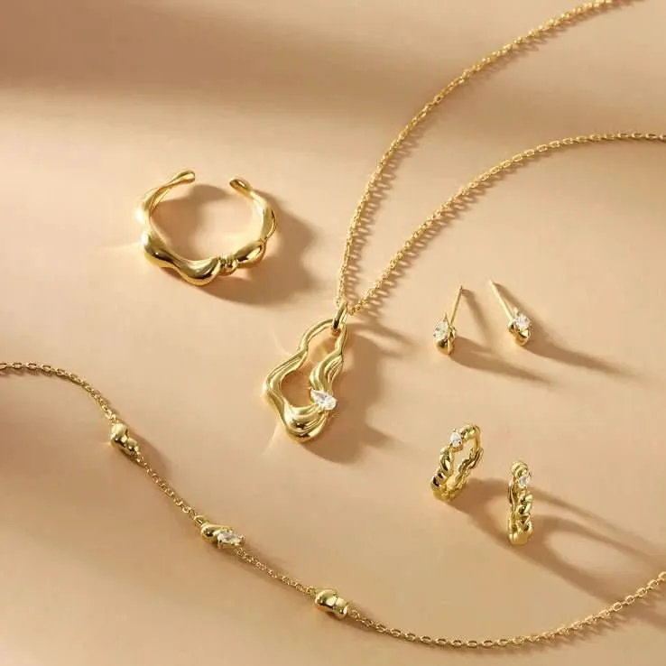 Ania Haie Gold Twisted Wave Huggie Hoop Earrings E050-01G
